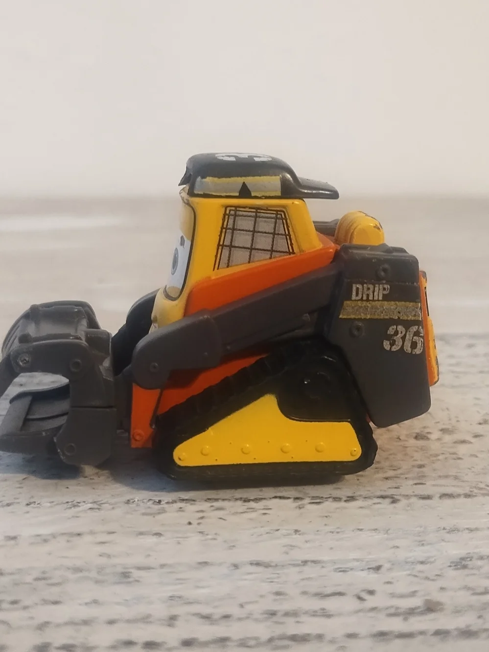 Disney Pixar Cars Drip 36 Track Vehicle Mattel Bulldozer Toy Yellow Black Figure